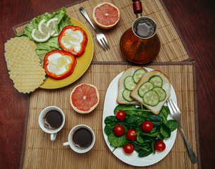 natural and healthy breakfast with toast, coffee and vegetables for vegetarian