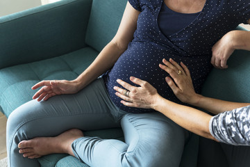 Pregnant support group meetup in a house