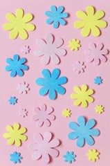 Pink background with colorful flowers