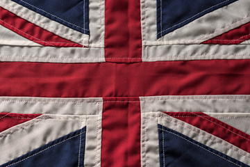 Sewn fabric British Union Jack flag shot straight on.