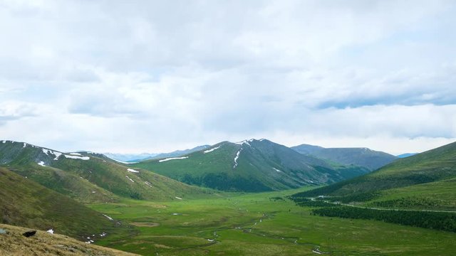 Beautiful timelapse with summer landscape in Khakassian high mountains and cloudy sky