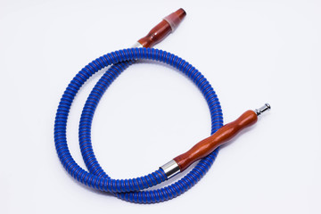 Parts of the hookah on blue wooden background.