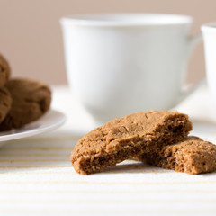Healthy breakfast with oatmeal cookies or oatcakes and cup of tea or coffee