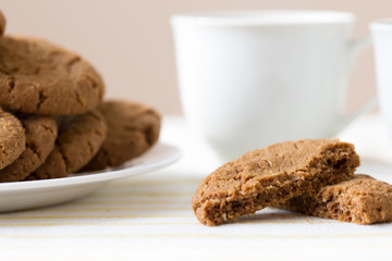 Healthy breakfast with oatmeal cookies or oatcakes and cup of tea or coffee