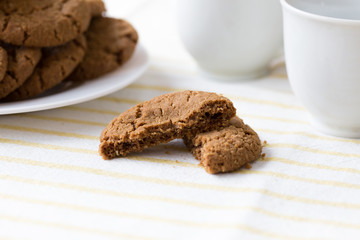 Healthy breakfast with oatmeal cookies or oatcakes and cup of tea or coffee