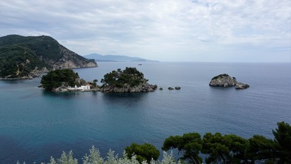 Fototapeta na wymiar Look at the island of Panagia. A Pearl of the Bay of Parga, Greece