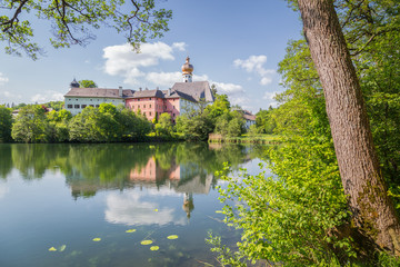 Fototapeta premium Cloister of Höglwörth in summer, Bavaria, Germany