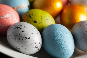 Happy easter! Easter eggs on wooden background