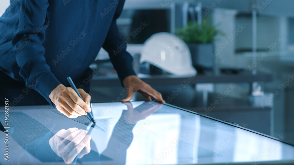 Aufkleber talented young female architectural designer draws building concept on a graphics tablet display ver