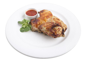 Grilled chicken with tomato sauce.