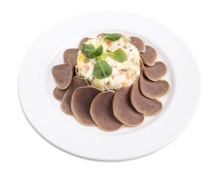 Russian salad with beef tongue.