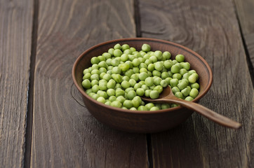 green peas on a dark background