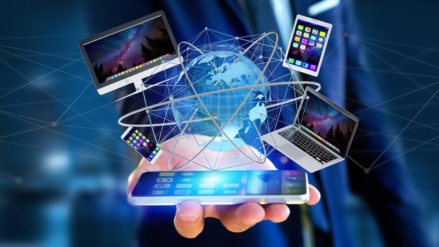 View of a Businessman holding a Computer and devices displayed on a smartphone interface with international network  - 3d render