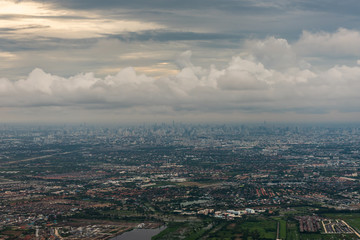 view from airplane to land with cloud