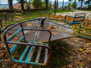 colored rusty playground in autumn