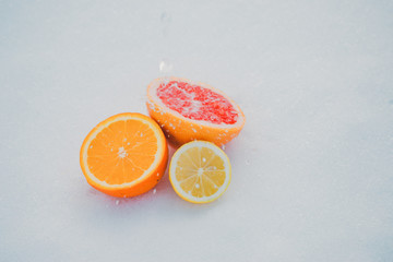Isolated citrus fruits. Pieces of lemon, lime , tangerine , pink grapefruit and orange isolated on white background.