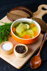 Fish soup served on the table in plate