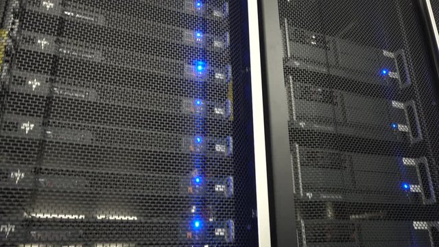 Servers in data center. Servers racks close up in Modern data center. Cloud computing datacenter server room.