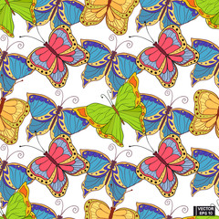 Seamless background with colored butterflies.