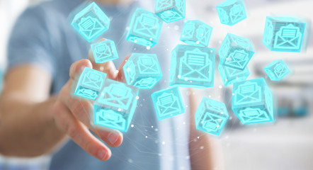 Businessman using floating cube emails 3D rendering