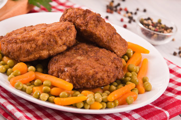 Meatballs on white dish. 