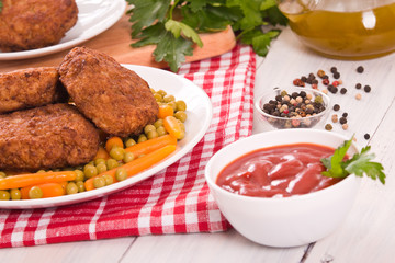 Meatballs on white dish. 