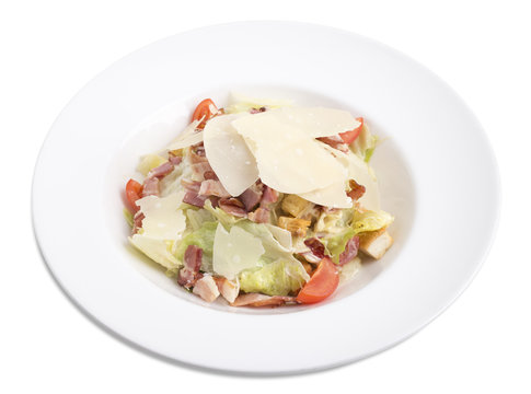 Caesar salad with bacon and parmesan.