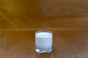 A glass of milk under the sun's rays
