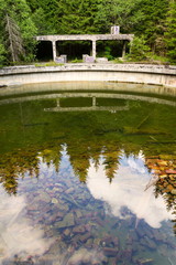 Concrete construction of ore floating tank at former tin mine Rolava and prison camp Sauersack near...
