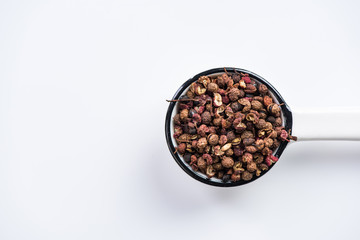 Sichuan pepper or Chinese coriander on spoon