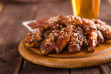 Grilled chicken wings with hot sauce