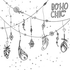 Boho feathers with diamonds and flowers.