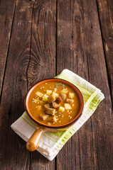 Goulash soup with croutons and potatoes
