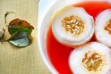 Succulent cucumbers served in red syrup as iftar soothing drink  during muslim fasting month.