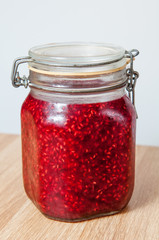 raspberry jam in jar isolated