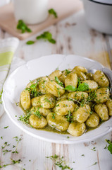 Pesto gnocchi, garlic and fresh herbs olive oil