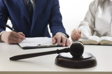 Law, advice and Legal services concept. Lawyer and attorney having team meeting at law firm.