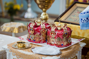 Fototapeta na wymiar crowns in church ready to wedding ceremony