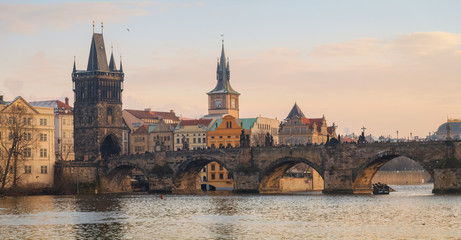 Coldy winter sunset over Charles bridge, Prague, Czechia