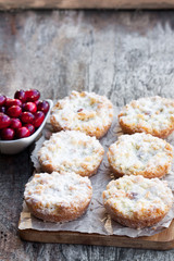 Crumble  topped fruit pies on wooden table. Christmas dessert.