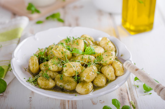 Pesto gnocchi, garlic and fresh herbs olive oil