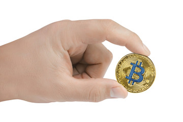 Golden bitcoin in hand isolated on white background