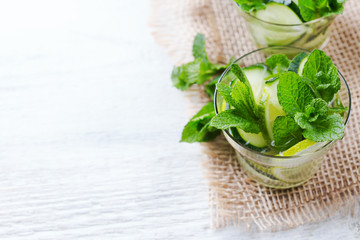 Cucumber lime mint fresh infused water detox drink cocktail lemonade