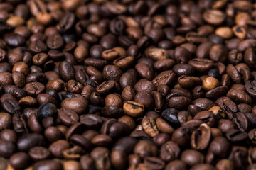 fried coffee beans. coffee beans, on a wooden background