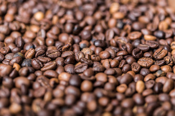 fried coffee beans. coffee beans, on a wooden background