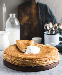 Pancakes crepes with sour cream russian traditional pancake week carnival
