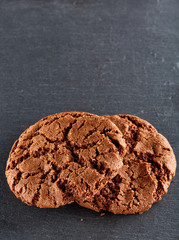 Chocolate chips cookies isolated on black background, macro, close-up