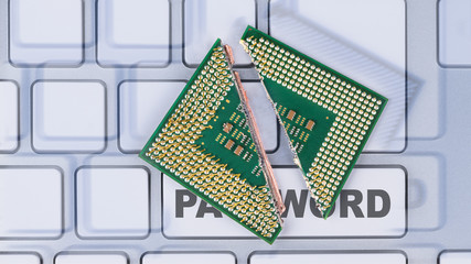 Broken modern processor with critical security error. Destroyed CPU on computer keyboard detail....