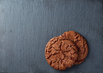Chocolate chips cookies isolated on black background, macro, close-up