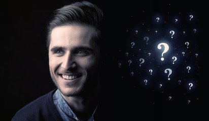 Obraz premium man with many question mark near him